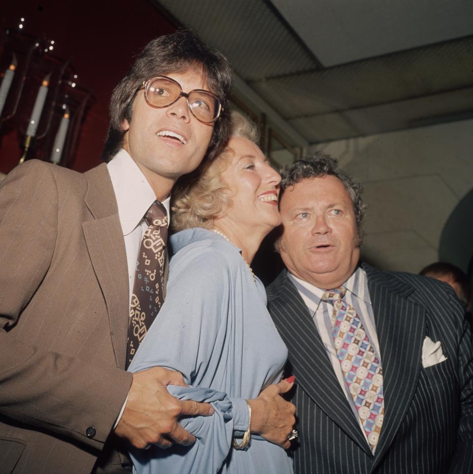 Cliff Richard and Harry Secombe pictured with Dame Vera Lynn.