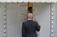 <p> A man enters Saudi Arabia's consulate in Istanbul, Friday, Oct. 19, 2018. A Turkish official said Friday that investigators are looking into the possibility that the remains of missing Saudi journalist Jamal Khashoggi may have been taken to a forest in the outskirts of Istanbul or to another city — if and after he was killed inside the consulate earlier this month. (AP Photo/Lefteris Pitarakis) </p>