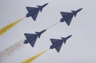 Members of the "August 1st" Aerobatic Team of the Chinese People's Liberation Army (PLA) Air Force perform during the 13th China International Aviation and Aerospace Exhibition, also known as Airshow China 2021, on Tuesday, Sept. 28, 2021, in Zhuhai in southern China's Guangdong province. (AP Photo/Ng Han Guan)