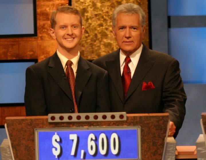 JEOPARDY! - SYNDICATED SHOW - PICTURED: KEN JENNINGS, CONTESTANT, AND ALEX TREBEK HOST OF GAME SHOW.ÒJEOPARDY!,Ó AMERICAÕS FAVORITE QUIZ SHOWÒ, PREMIERES 21st SEASON ON SEPTEMBER 6th, 2004