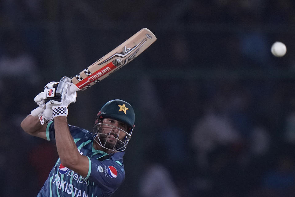 Pakistan's Shan Masood plays a shot during the first T20 cricket match between Pakistan and England, in Karachi, Pakistan, Tuesday, Sept. 20, 2022. (AP Photo/Anjum Naveed)