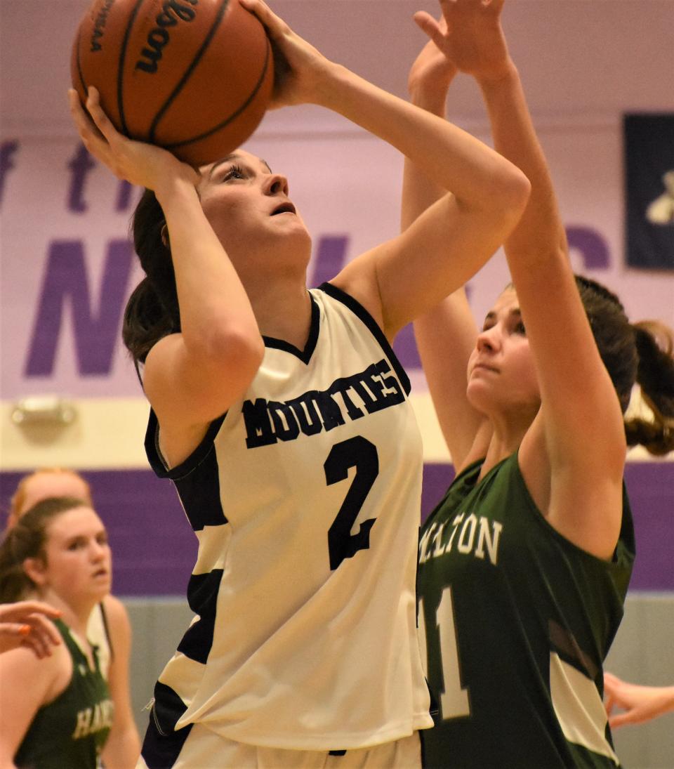 Ava Grcic (2) puts up a shot for Little Falls during Wednesday's game against Hamilton. Grcic scored seven points in overtime of a 69-58 victory in the meeting of unbeaten teams.