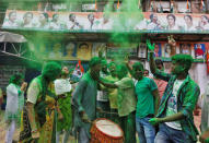 Supporters of Trinamool Congress (TMC) celebrate after learning the initial poll results of the West Bengal Assembly elections, in Kolkata, India May 19, 2016. REUTERS/ Rupak De Chowdhuri