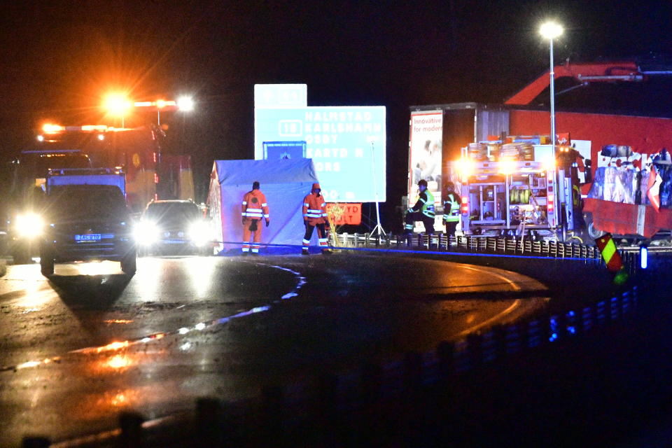 People work on the scene after an accident on Sunday, Oct. 3, 2021 outside the town Markaryd in Sweden. Three people died in the accident one of them is the Swedish artist Lars Vilks and the other two were police officers. Lars Vilks has had a permanent police protection and body guards after several attempts have been made to attack him. He has been under constant threat after portraying the Prophet Muhammad as a dog. (Johan Nilsson/TT via AP)