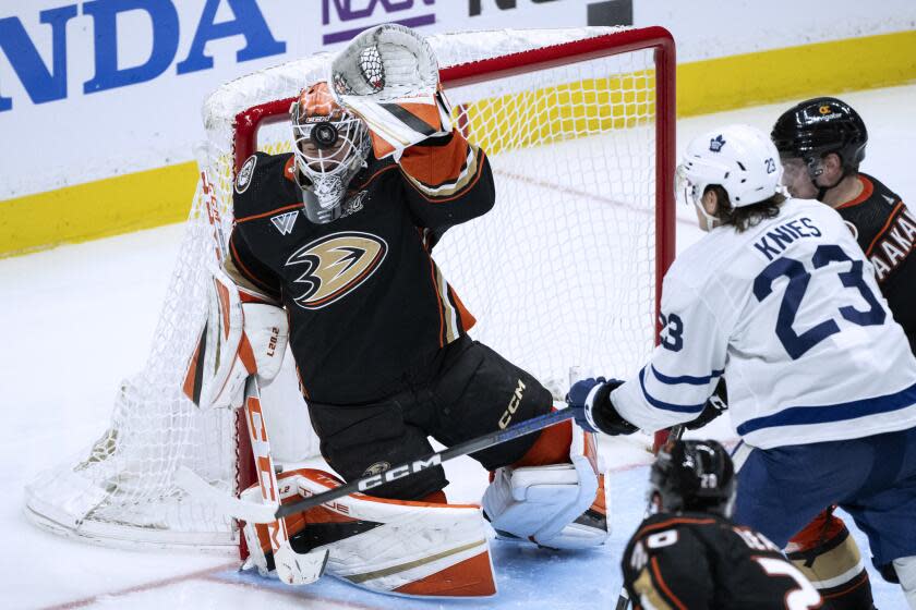 Ducks goaltender Lukas Dostal blocks a Maples Leafs shot during the third period Wednesday