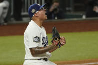 Los Angeles Dodgers pitcher Julio Urias celebrates after defeating the Tampa Bay Rays 3-1 to win the baseball World Series in Game 6 Tuesday, Oct. 27, 2020, in Arlington, Texas. (AP Photo/Eric Gay)