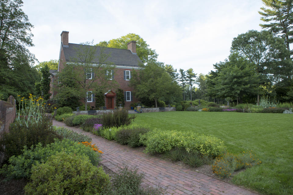 This image provided by Mt. Cuba Center shows the formal native plant garden blooming at the botanical garden, located in Hockessin, Del. Plantings depicted are: Amsonia tabernaemontana 'Storm Cloud', Asclepias tuberosa, Coreopsis verticillata 'Crazy Cayenne', Gillenia trifoliata 'Pink Profusion', Monarda didyma 'AChall', Penstemon 'Dark Towers', Physocarpus opulifolius 'SMPOTW', Rudbeckia maxima, Sisyrinchium angustifolium 'Lucerne', Solidago sphacelata 'Golden Fleece' and Symphyotrichum oblongifolium 'October Skies'. (Alessandra N. Stokley/Mt. Cuba Center via AP)