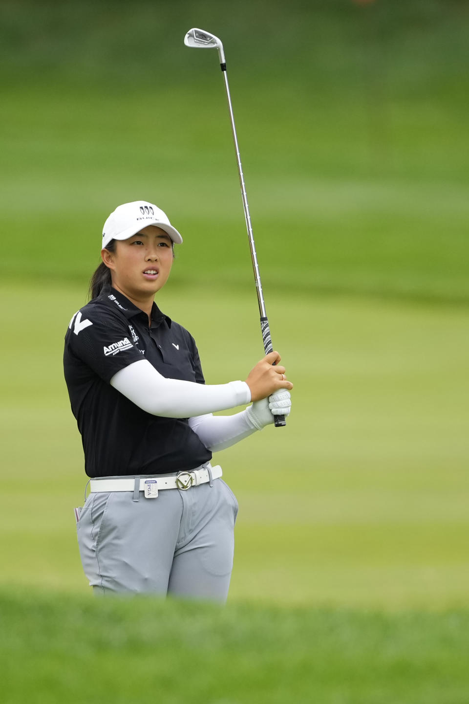 Ruoning Yin, of China, hits from the first fairway during the first round of the Women's PGA Championship golf tournament, Thursday, June 22, 2023, in Springfield, N.J. (AP Photo/Matt Rourke)