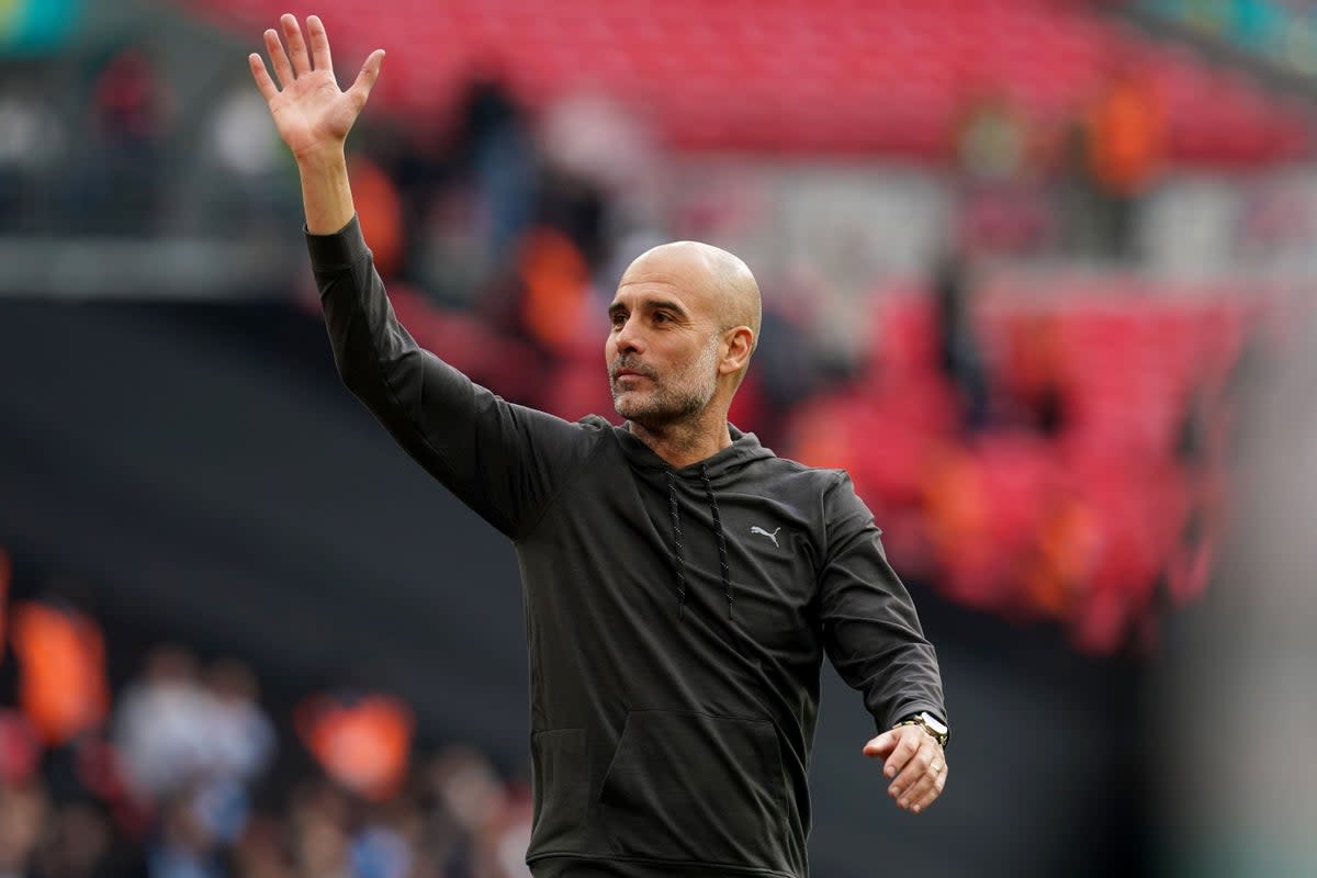 Manchester City manager Pep Guardiola salutes to the fans after the win (PA) (PA Wire)