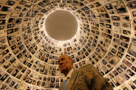 FILE PHOTO - Russian poet Yevgeny Yevtushenko visits the Hall of Names at the Yad Vashem Holocaust Memorial in Jerusalem November 15, 2007. REUTERS/Gil Cohen Magen/File Photo