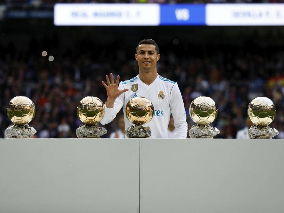 Cristiano Ronaldo and Lionel Messi have won the award a record five times each (Getty)