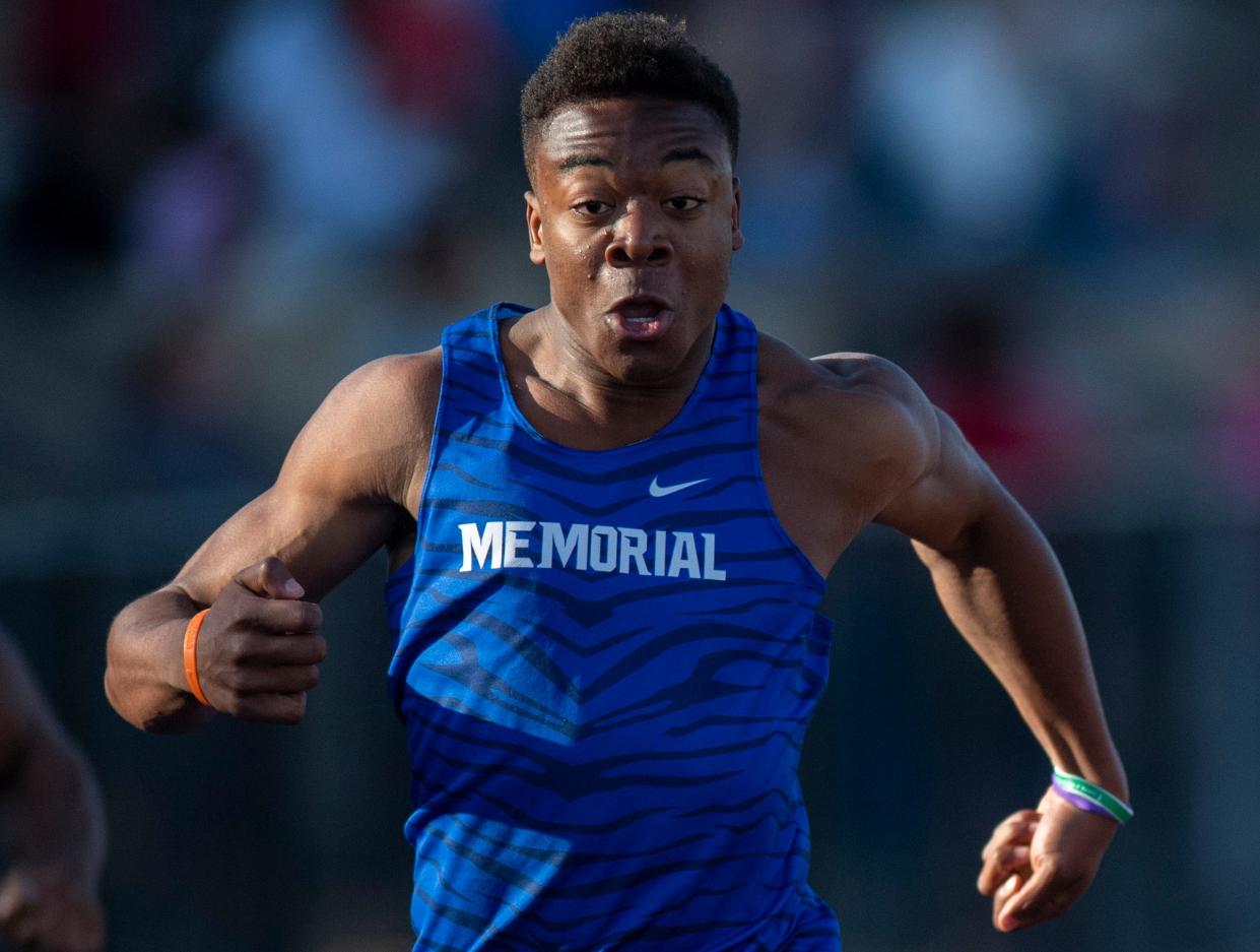 Memorial’s Dasmon Johnson wins the boys 100 meter dash with a time of 11.04 seconds during the 2024 City Track and Field Meet at Central High School Friday, April 19, 2024.