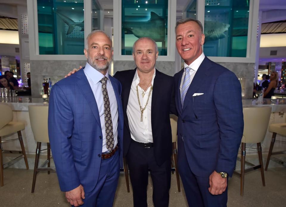 <div class="inline-image__caption"><p>Lorenzo Fertitta, left, and his brother Frank, right, with artist Damien Hirst at the Palms Casino Resort in 2018.</p></div> <div class="inline-image__credit">David Becker/Getty</div>