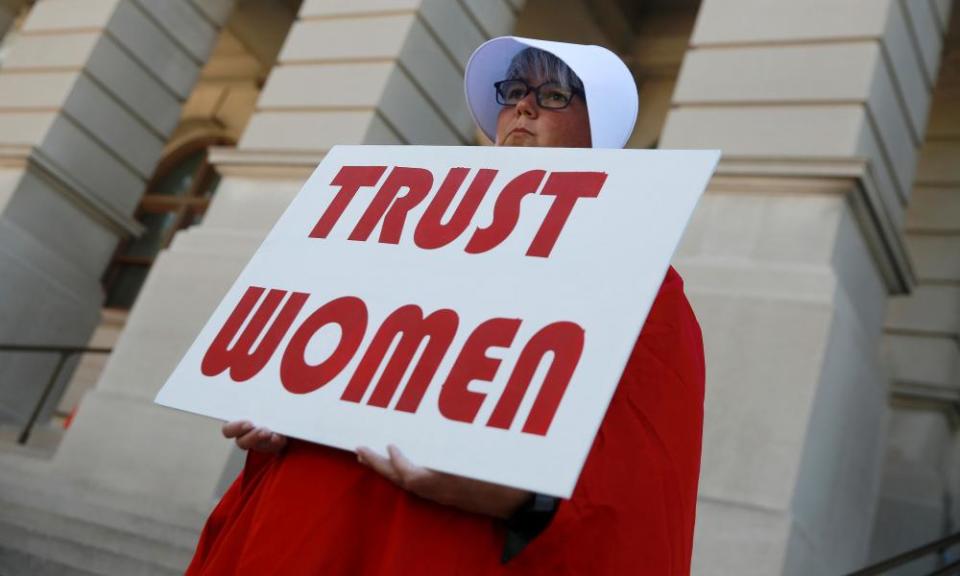 Lisa Stamey protests Georgia’s anti-abortion “heartbeat” bill at the Georgia state capitol in Atlanta.