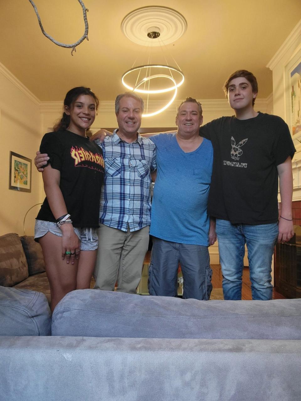 Steven Piacquadio, second from left, and Chris Schwam, third from left, had their son, Nicolas, via surrogate 18 years ago, and adopted their daughter, Alexa, 12 years ago.