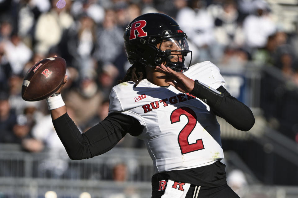 Rutgers quarterback Gavin Wimsatt (2) looks to pass against Penn State during the first half of an NCAA college football game, Saturday, Nov. 18, 2023, in State College, Pa. (AP Photo/Barry Reeger)