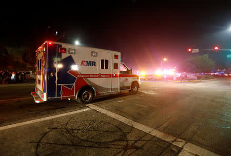 An emergency vehicle arrives at the site of a mass shooting at a bar in Thousand Oaks, California, U.S. November 8, 2018. REUTERS/Ringo Chiu