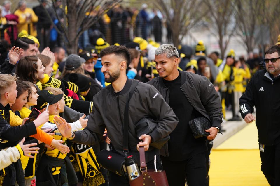 Apr 6, 2024; Columbus, OH, USA; Columbus Crew forward Diego Rossi (10) and forward Cucho Hernandez (9) arrive at Lower.com Field. Mandatory Credit: Adam Cairns-The Columbus Dispatch