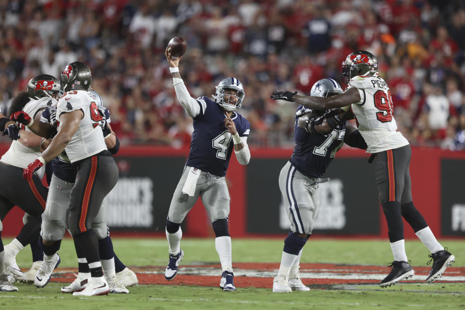 Dallas Cowboys quarterback Dak Prescott (4) throws a pass during an NFL football game against the Tampa Bay Buccaneers, Thursday, Sept 9, 2021 in Tampa, Fla. (AP Photo/Don Montague)