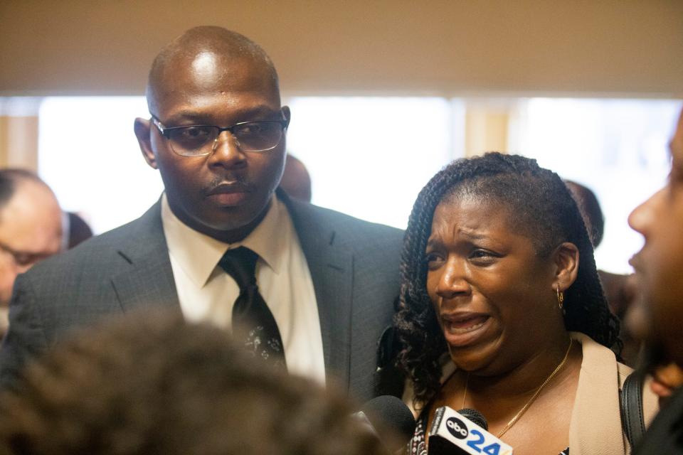 Memphis activist Kareem Ali stands with Keyana Dixon, Tyre Nichols’ sister, as she speaks to the press after the five former Memphis Police Department officers charged with the killing of Tyre Nichols made a court appearance at Shelby County Criminal Court in Memphis, Tenn., on Friday, June 23, 2023. This was the first time Dixon had seen the five officers in person. 