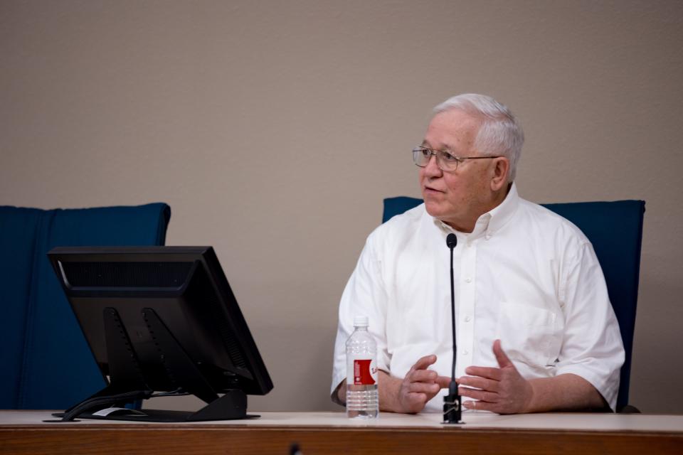 Ruben Garcia, director of Annunciation House, sits at the witness stand answering questions from Jerome Wesevich, a lawyer with Texas RioGrande Legal Aid representing Annunciation House during a motion hearing with Judge Francisco Dominguez in the 205th District Courtroom on Thursday, March 7, 2024.