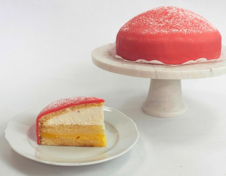 The princess cake, lemon sponge cake layered with vanilla cream and whipped cream and topped with almond marzipan, is a Valentine's Day favorite at Sant Ambroeus.