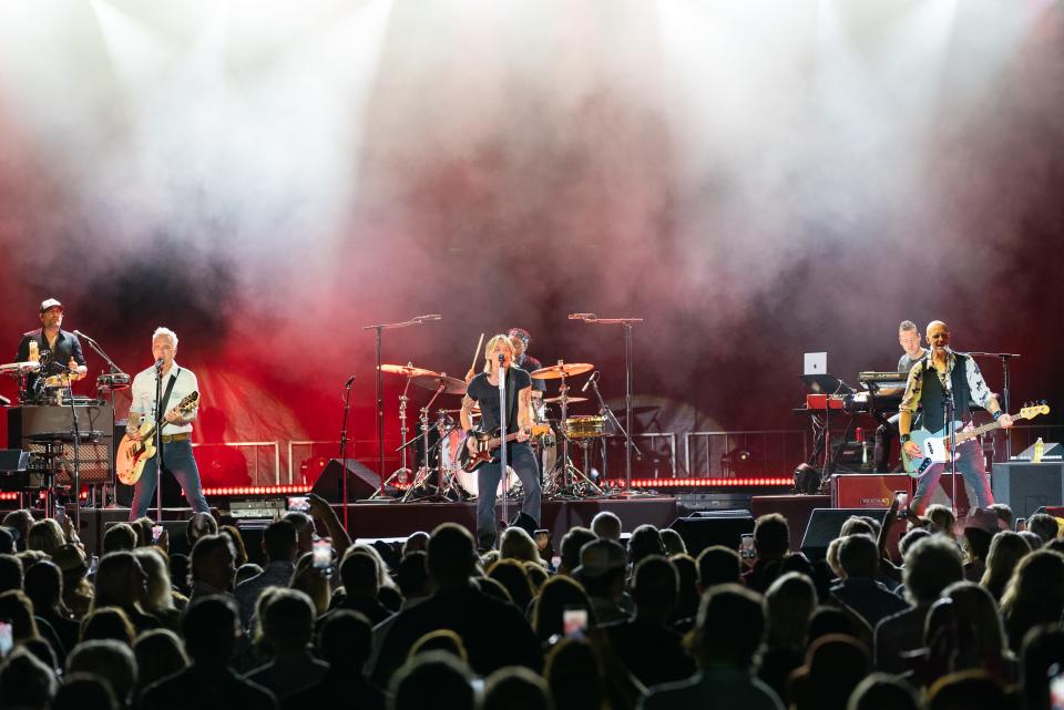 Country music superstar Keith Urban and his band perform in Naples on Nov. 16, 2022, at Tiburon Golf Club before about 2,000, including many first responders to thank them for their efforts in the aftermath of Hurricane Ian. (Photo by Brendan Williamson)