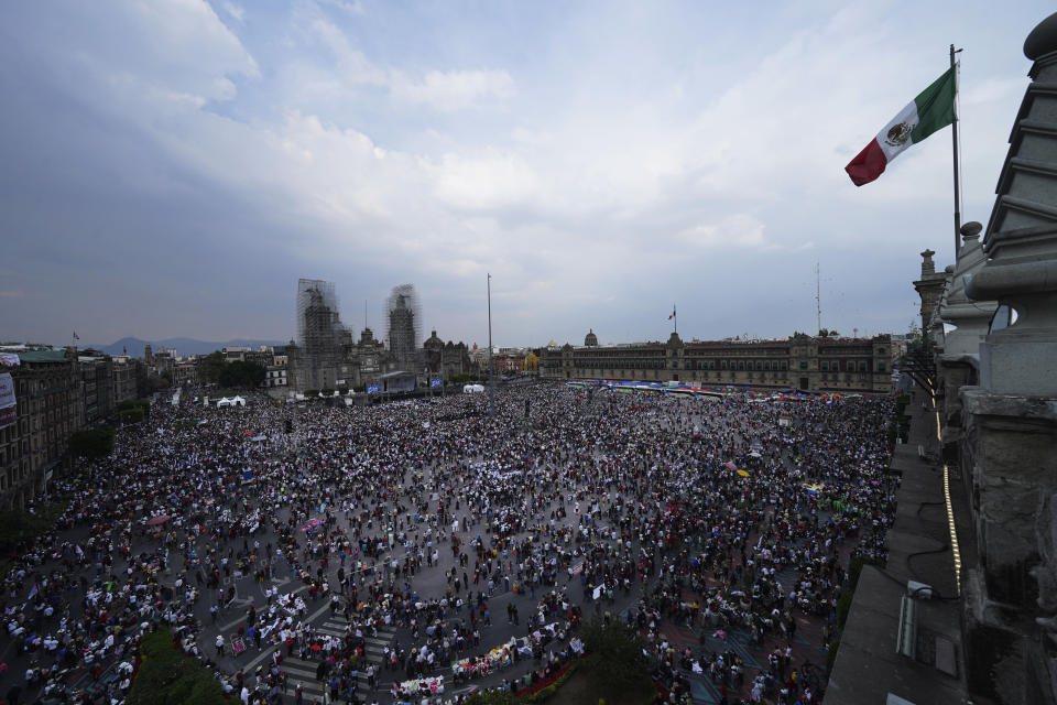 People gather at the capital's main square, the Zócalo, as they listen to Mexican President Andrés Manuel López Obrador in Mexico City, Sunday, November 27, 2022. (AP Photo / Marco Ugarte)