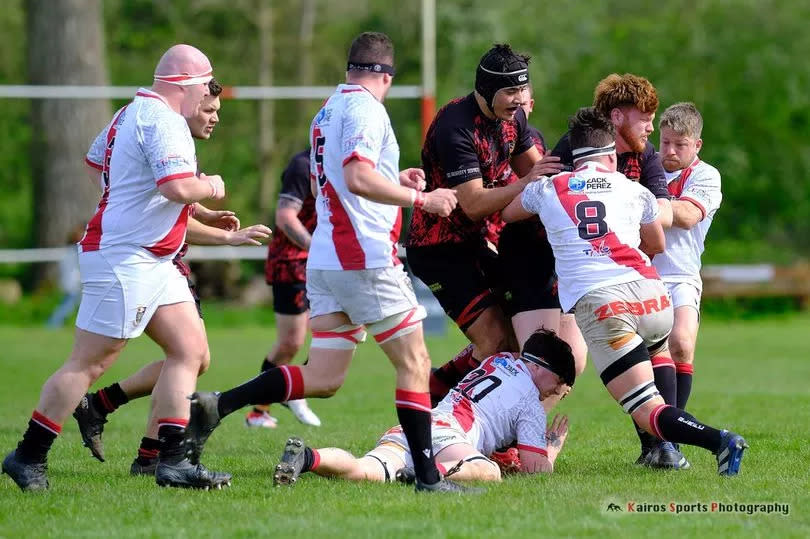 Gordon League tacklers combine to stop a Bream attack in Saturday's promotion play-off/Community Cup double header -Credit:Nigel Miller