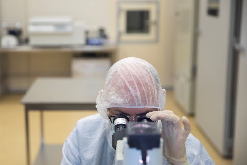 FILE PHOTO: A specialist works at Binnopharm pharmaceutical plant which develops "Gam-COVID-Vac" vaccine against the coronavirus disease near Moscow