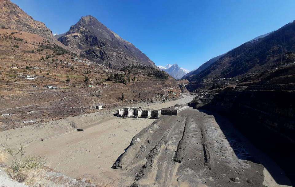 A view of the damaged Dhauliganga hydropower project at Reni village in Chamoli district after a portion of Nanda Devi glacier broke off in Tapovan area of the northern state of Uttarakhand, Sunday, Feb.7, 2021. (AP Photo)