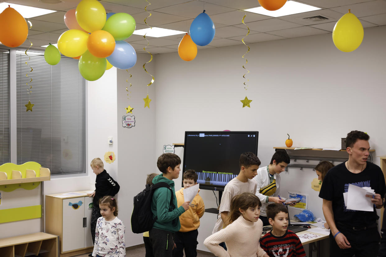 Ukrainians spend time at the UNICEF facility in Warsaw, Poland, Wednesday, Nov. 9, 2022. The U.S. Ambassador to the United Nations says she does not expect the U.S. midterm election to weaken U.S. support for Ukraine given the bipartisan support for Kyiv since Russia’s invasion of its neighbor. Linda Thomas-Greenfield spoke after she visited a UNICEF center in Warsaw that has become a hub for Ukrainian refugee children in their mothers, offering educational support and therapy. (AP Photo/Michal Dyjuk)