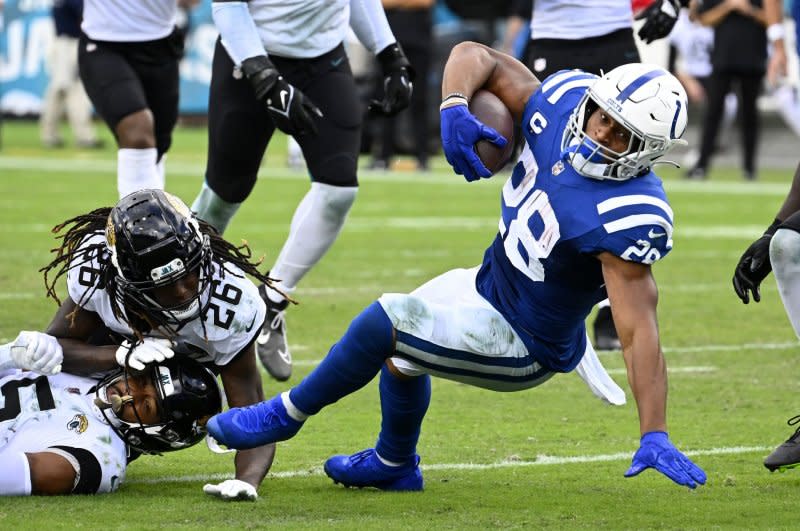 Indianapolis Colts running back Jonathan Taylor (R) is expected to miss at least two or three weeks of action because of a thumb injury. File Photo by Joe Marino/UPI