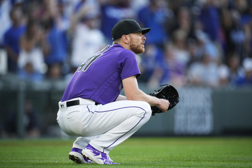 Colorado Rockies starting pitcher Chad Kuhl reacts after giving up a two-run home run to Los Angeles Dodgers' Trayce Thompson during the second inning of a baseball game Friday, July 29, 2022, in Denver. (AP Photo/David Zalubowski)
