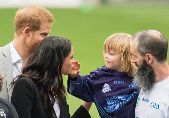 Prince Harry, Duke of Sussex and Meghan, Duchess of Sussex meet Walter Cullen, aged 3 at Croke Park, home of Ireland's largest sporting organisation, the Gaelic Athletic Association on July 11, 2018 in Dublin, Ireland.