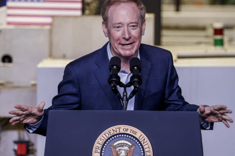 Microsoft President Brad Smith speaks before President Joe Biden takes the stage at Gateway Technical College in Sturtevant, Wis., on Wednesday. Photo by Tannen Maury/UPI