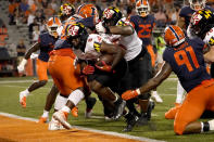 Maryland running back Tayon Fleet-Davis (8) rushes for a touchdown during the second half of the team's NCAA college football game against Illinois on Friday, Sept. 17, 2021, in Champaign, Ill. Maryland won 20-17. (AP Photo/Charles Rex Arbogast)