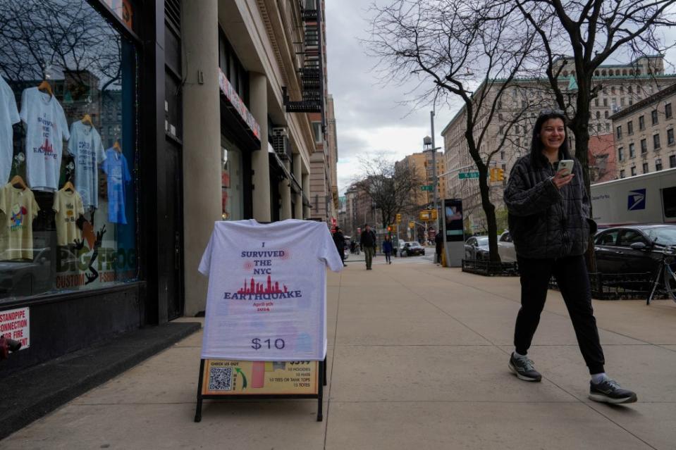 A shirt is displayed as earthquake themed T-shirts are being sold at Big Frog Custom T Shirts in NYC. REUTERS