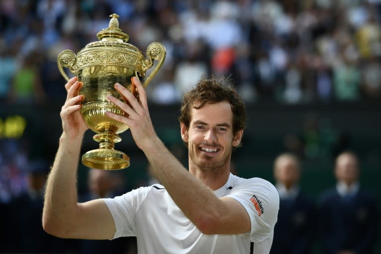 Britain's Andy Murray celebrates winning the 2016 Wimbledon title (GLYN KIRK)