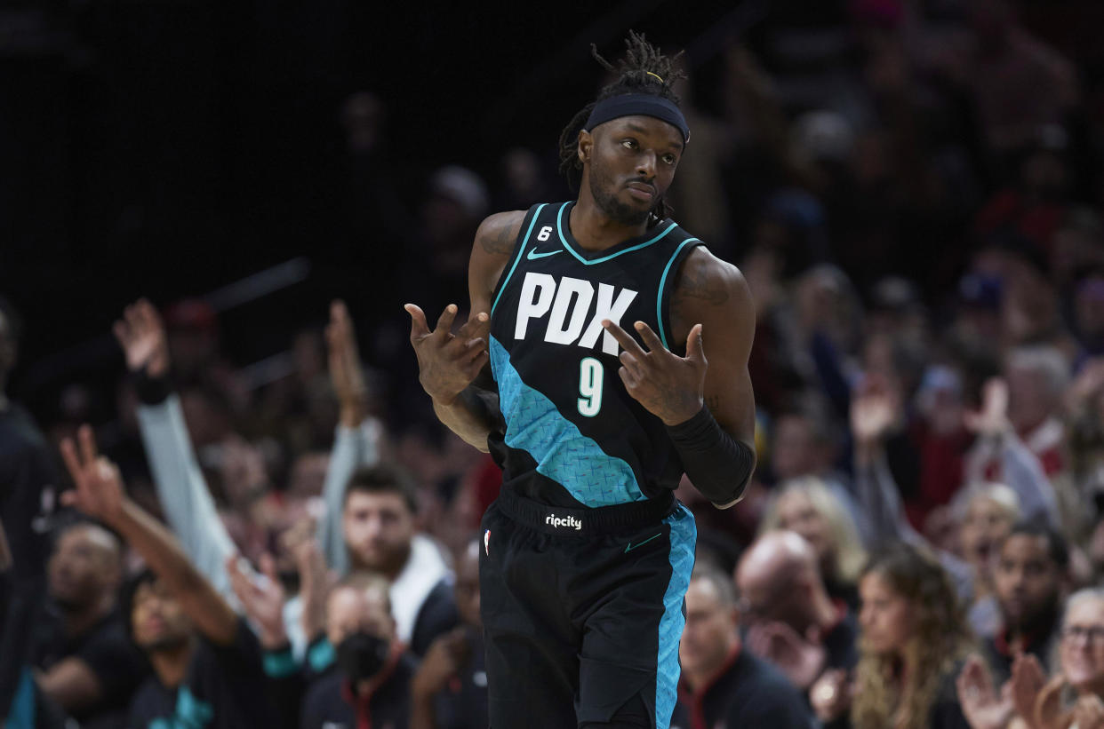 Portland Trail Blazers forward Jerami Grant reacts after making a 3-point basket against the San Antonio Spurs during the first half of an NBA basketball game in Portland, Ore., Tuesday, Nov. 15, 2022. (AP Photo/Craig Mitchelldyer)
