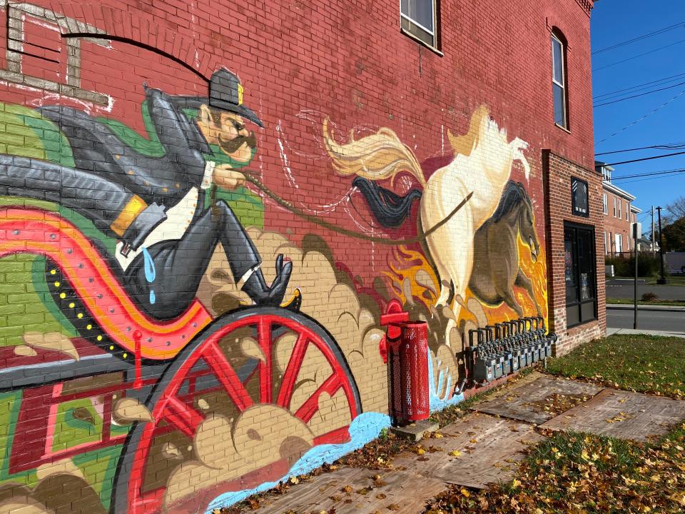 This mural, painted by Taunton artist Ryan Jones on the side of The King's Court Gaming and Collectibles on Bay Street, seen here on Tuesday, Oct. 31, 2023, is slated to be completed by the end of November, according to the city.