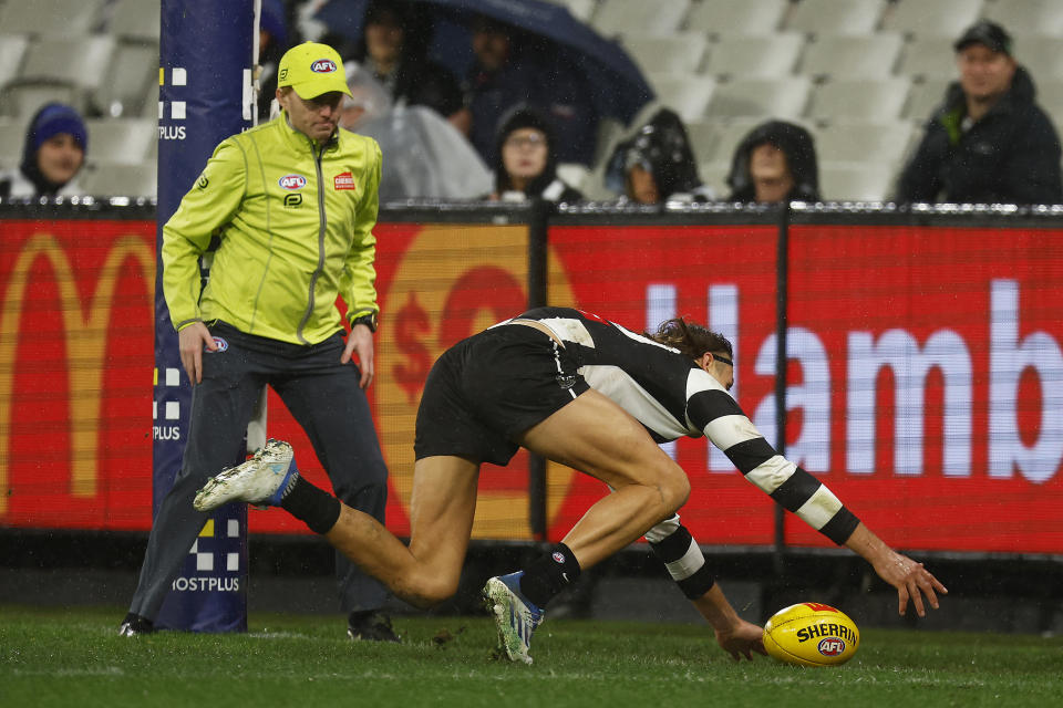 Darcy Moore, pictured here being pinged for a deliberate rushed behind in Collingwood's win over GWS.