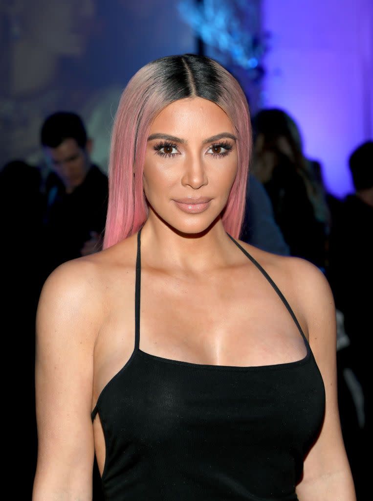 <p>If you have naturally darker hair, don't worry — peach hair can still look great on you. Keep the look lower maintenance by leaving your roots alone and fading subtly into the color, like<strong> Kim Kardashian</strong>. </p>