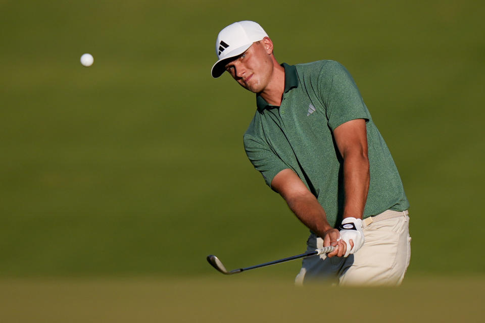 Ludvig Aberg, of Sweden, chips to the green on the 13th hole during the third round of the U.S. Open golf tournament Saturday, June 15, 2024, in Pinehurst, N.C. (AP Photo/Frank Franklin II)