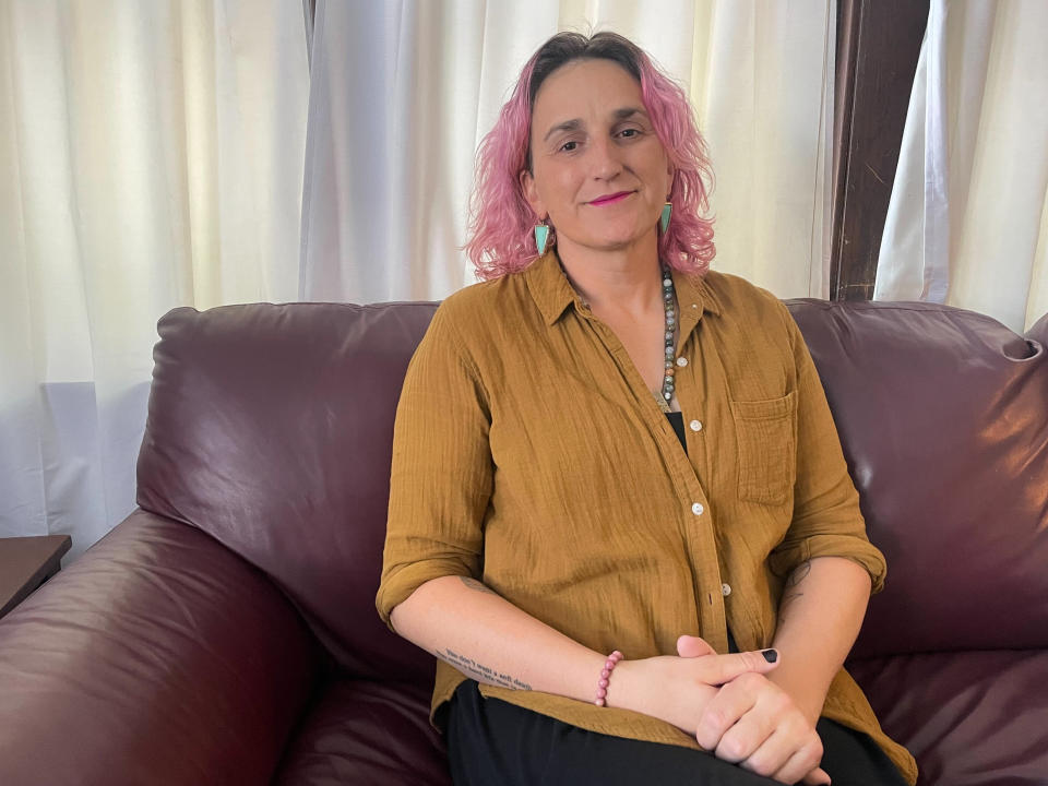 Leigh Finke, the first transgender person ever elected to Minnesota's state Legislature, poses for a portrait at her home in St. Paul, Minn., on Nov. 18, 2022. Finke is set to join the state's most diverse Legislature yet in January. (AP Photo/Trisha Ahmed)