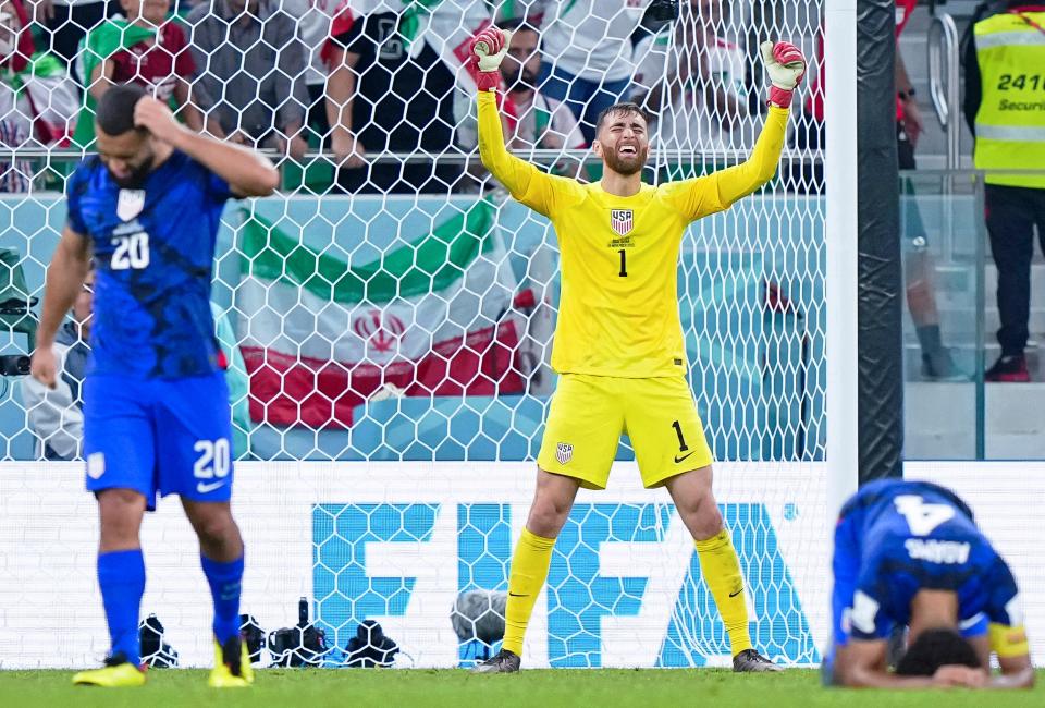 United States of America goalkeeper Matt Turner (1) celebrates after winning a group stage match against Iran to advance to the round of sixteen during the 2022 World Cup at Al Thumama Stadium.