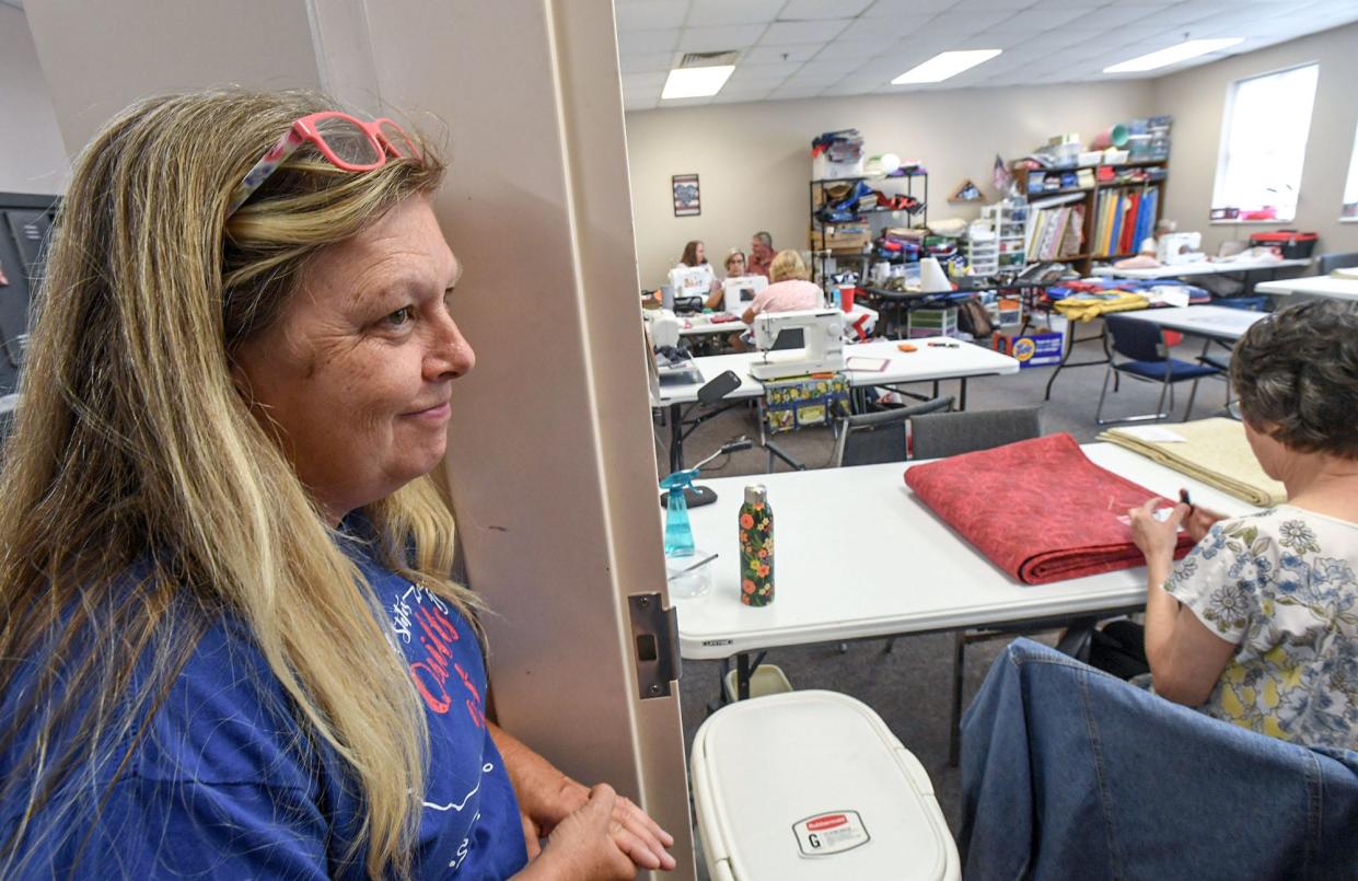 Kim Price, State Coordinator and Regional Coordinator
Quilts of Valor Foundation, walks in the room where many quilts are made for veterans, Monday, August 12, 2024.