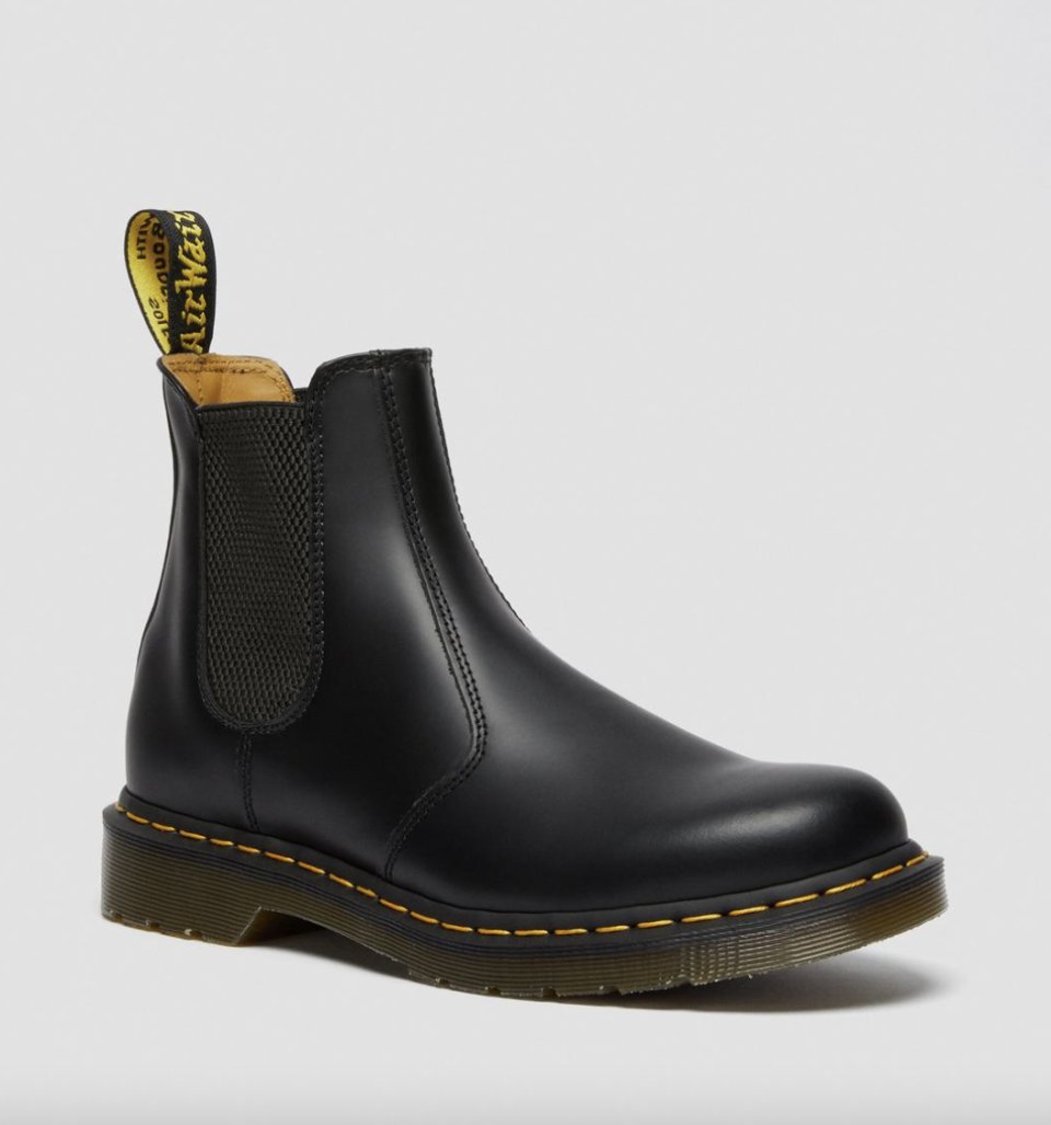 Dr. Martens 2976 Smooth Leather Chelsea Boots in black with yellow pull tab (Photo via Dr. Martens)