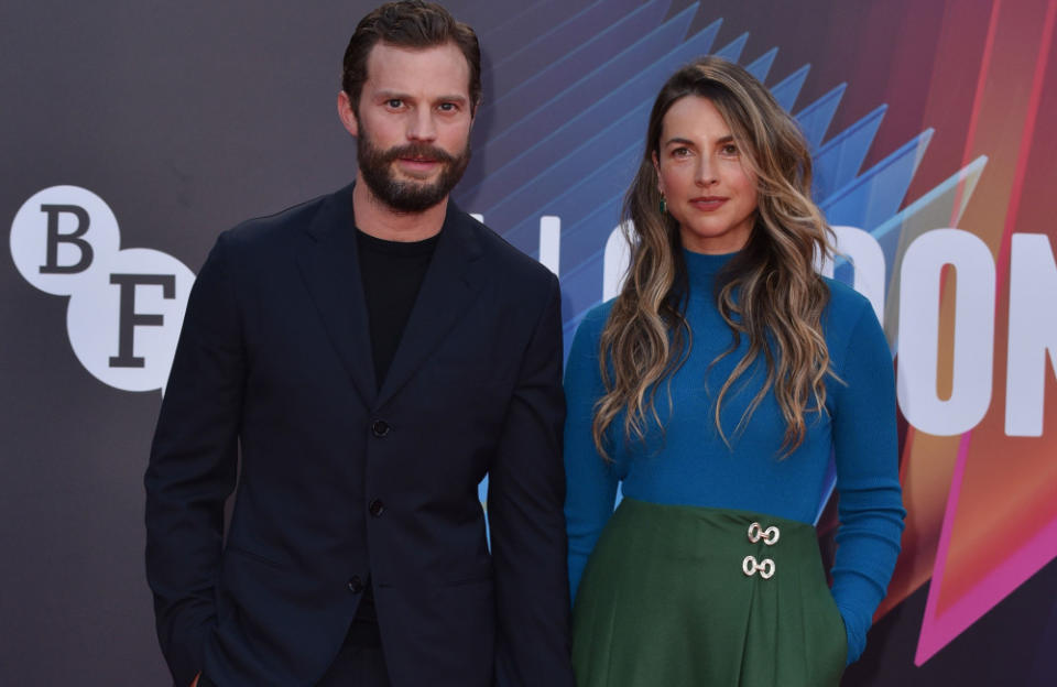 Jamie Dornan has shot more intimate scenes than most due to his role as Christian Grey in the '50 Shades...' franchise. His wife, singer/songwriter Amelia Warner, is not a fan of said scenes. He previously said: “She doesn’t want to watch this. She wants to support me and my work. I won’t be able to sit there myself. I am not going to put any pressure on her either way. It’s her decision. She’s well aware that it’s pretend, but it’s probably not that comfortable to watch.”