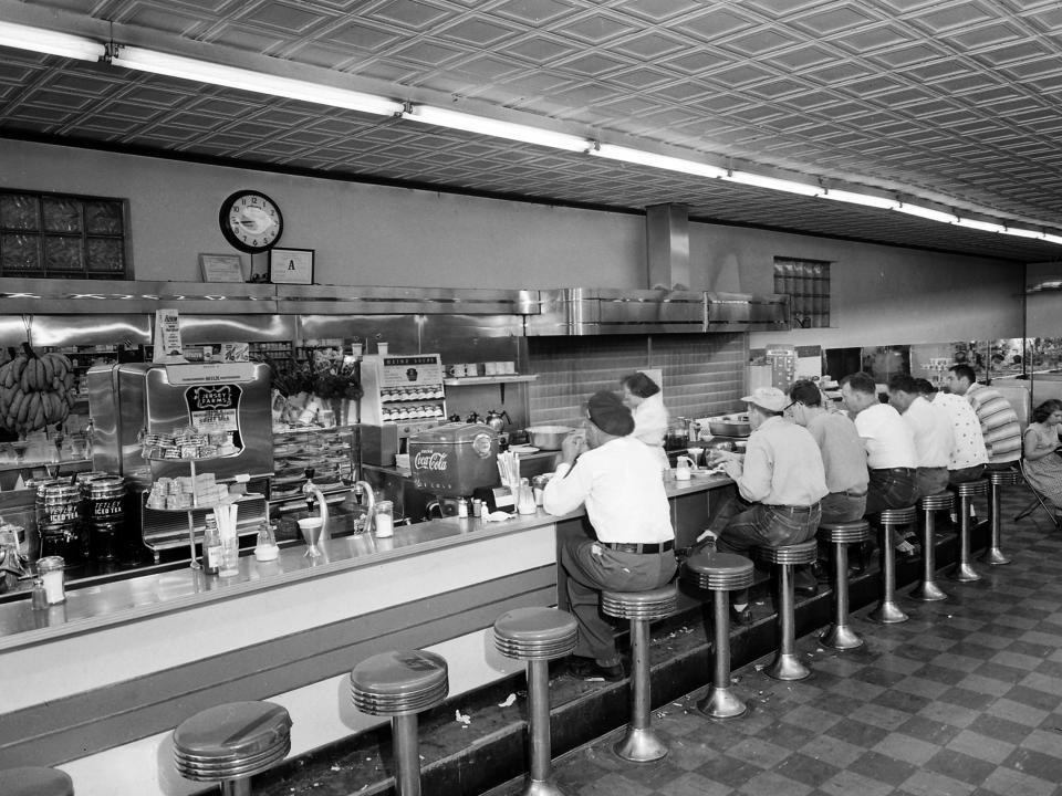 A view of people eating at a lunch counter circa 1950 in downtown Nashville, Tennessee.